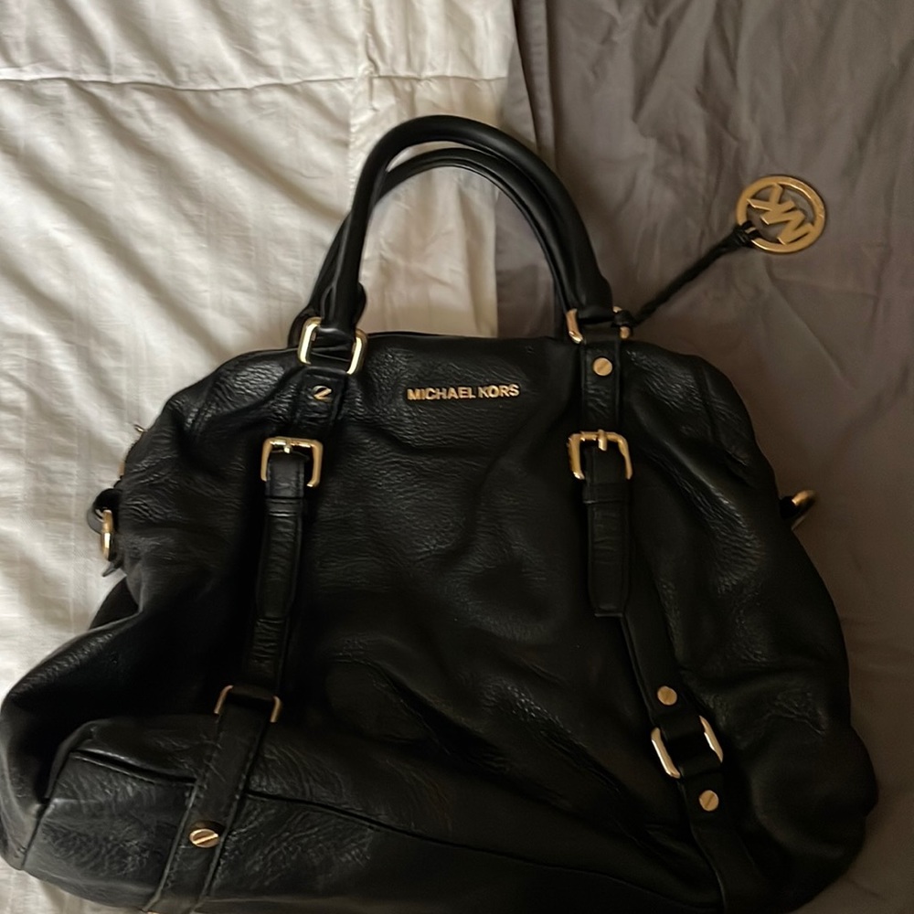 Black Michael Kors leather bag.  Excellent condition.